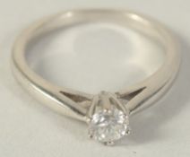 AN 18CT GOLD DIAMOND SINGLE STONE RING 0.24CT.