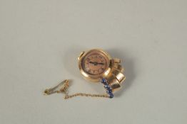 A GOLD WATCH BROOCH.