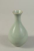 A CHINESE CELADON GLAZED RU WARE VASE. 13.5cms high.