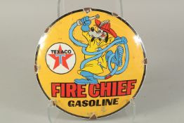 A CIRCULAR ENAMEL SIGN, 