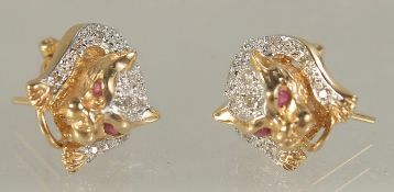 A PAIR OF 14CT GOLD DIAMOND PANTHER EARRINGS.