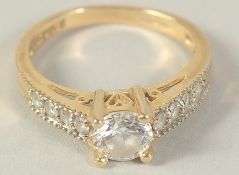A 9CT GOLD CUBIC ZIRCONIA RING