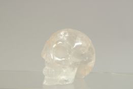A ROCK CRYSTAL SKULL.