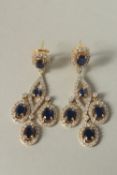 AN 18CT GOLD SAPPHIRE AND DIAMOND DROP EARRINGS