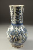 A FINE 19TH CENTURY PERSIAN QAJAR GLAZED POTTERY VASE, 27cm high.