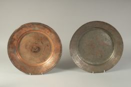 TWO 18TH-19TH CENTURY PERSIAN ENGRAVED TINNED COPPER DISHES, one unusually with unfinished engraving