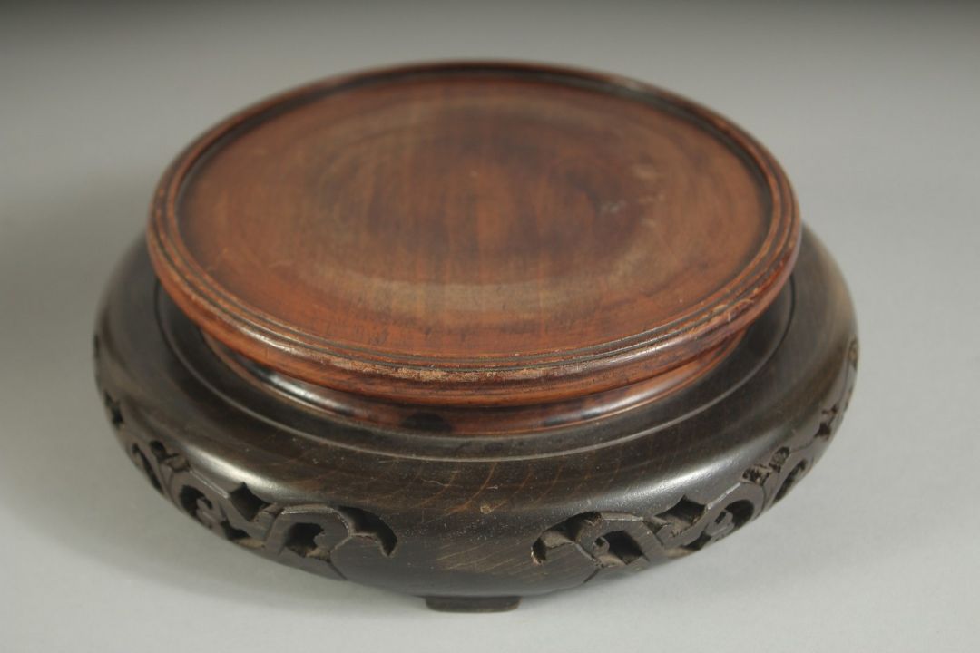 A CHINESE CARVED HARDWOOD CIRCULAR STAND, with pierced base, the stand to house a base of 14cm - Image 4 of 4