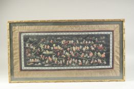 A CHINESE EMBROIDERED SILK 'HUNDRED BOYS' TEXTILE, framed and glazed, textile 31.5cm x 65cm.