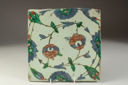 A FINE 17TH CENTURY OTTOMAN TURKISH IZNIK TILE, 25cm x 25cm.