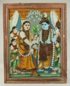 A LARGE LATE 19TH CENTURY SOUTH INDIAN TANJORE REVERSE PAINTING ON GLASS, depicting Krishna and