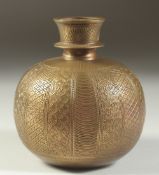A FINELY ENGRAVED 18TH-19TH CENTURY MUGHAL INDIAN BRASS ROUND HUQQA BASE, 16.5cm high.