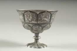 A VERY FINE CHINESE SILVER STEM CUP, embossed and chased with scenes of animals, 6cm high, 7.5cm