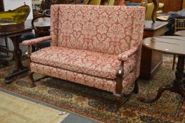 A George II style mahogany framed high back settee.