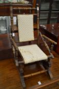 A child's American style rocking chair.
