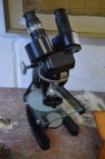 A binocular microscope.