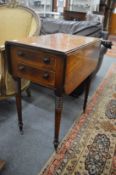 A 19th century mahogany drop-flap two drawer work table.