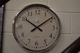 A large circular wall clock.