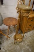 A tripod table and jardiniere stand.