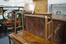 An unusual oak reading table.