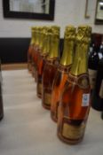 Eight bottles of Cremant de Loire sparkling rose.