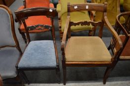 A Regency mahogany desk chair together with another chair.