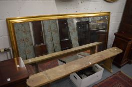 A large modern rectangular gilt framed mirror 203cm x 122cm.