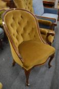 A good Victorian mahogany framed and button upholstered bedroom chair.