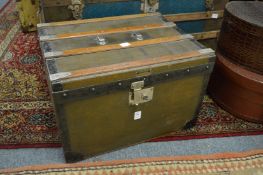 A good small metal and wooden bound travelling trunk.