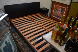 A stylish modern bed frame with headboard 6ft 9