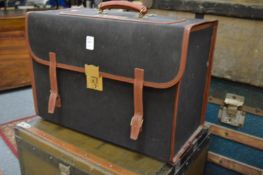 Lloyd Jennings of London, a leather and canvas eight bottle travelling trunk.