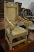 A child's hardwood panel back armchair.