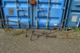 An early wrought iron horse drawn hoe.