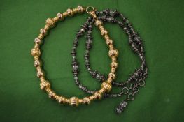 Two stylish necklaces.