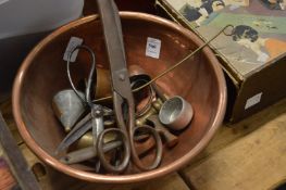 Copper bowl with various other items.