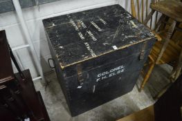 A large painted wooden trunk.