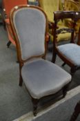 A Victorian mahogany framed and upholstered bedroom chair.