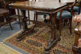 A 19th century rosewood stretcher or library table.