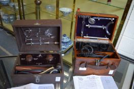 An Everay mahogany high frequency examination machine together with another similar.