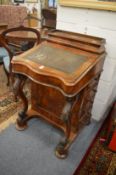 A Victorian walnut Davenport.