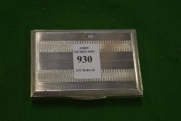 A very good Continental silver cigarette box with engine turned decoration, the interior of the