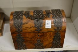 A good brass bound walnut dome topped casket.