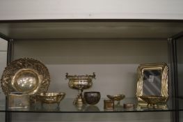 A collection of silverware to include an embossed dish, pedestal bowl, a photograph frame etc.