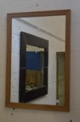 A modern oak framed mirror.