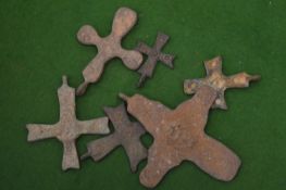Bronze crucifixes.