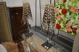 A pair of unusual table lamps with porcupine quill shades.