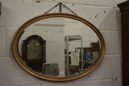 An oval mirror.
