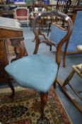 A good set of four Victorian carved walnut balloon back dining chairs.