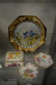 A Mintons plate decorated with a kingfisher by M M Smith, 1888, and three items of Dresden