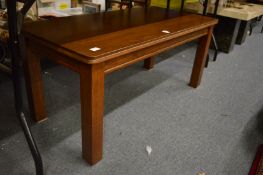 A hardwood coffee table.