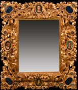An outstanding early 19th Century carved giltwood frame, rebate size 28